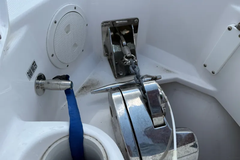 Slide: The Image of Anchor system on 2022 Everglades 365 Center Console boat, featuring stainless steel components. - 41