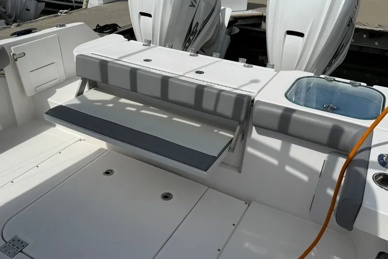 Slide: The Image of 2022 Everglades 365 Center Console boat interior with seating and storage features. - 31