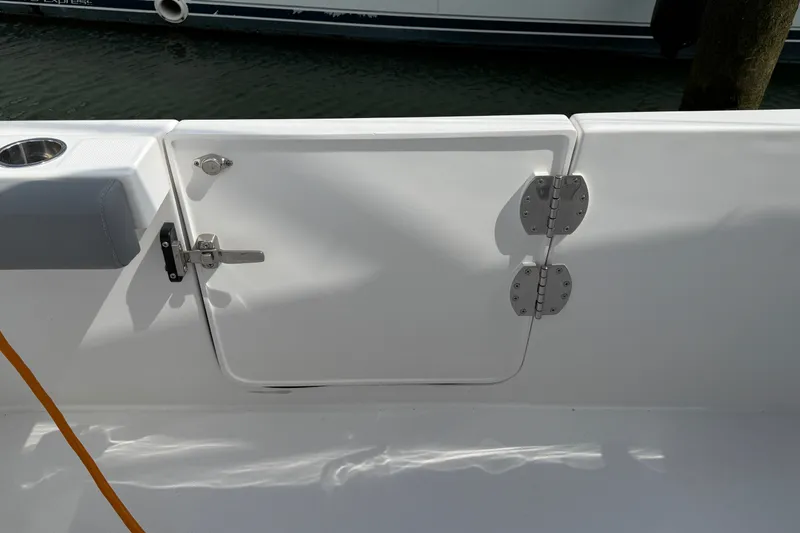 Slide: The Image of 2022 Everglades 365 Center Console boat door with stainless steel hinges and latch. - 33