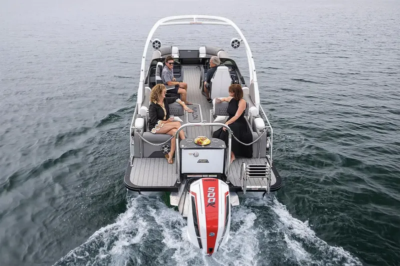 Slide: The Image of Manufacturer Provided Image: 2025 Avalon Excalibur LTD Quad Lounge boat cruising with passengers on open water. - 3