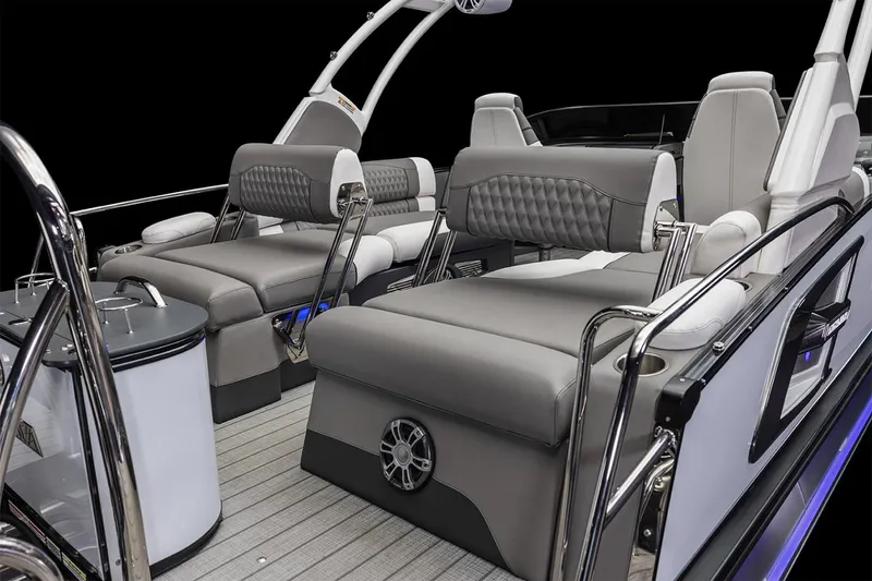Slide: The Image of Manufacturer Provided Image: 2025 Avalon Excalibur LTD Quad Lounge Windshield interior with luxurious seating and modern design. - 8
