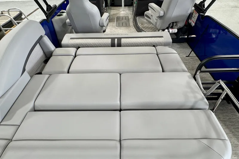 Slide: The Image of 2026 Bennington 23 M Center Swingback boat interior with plush seating and modern design. - 20