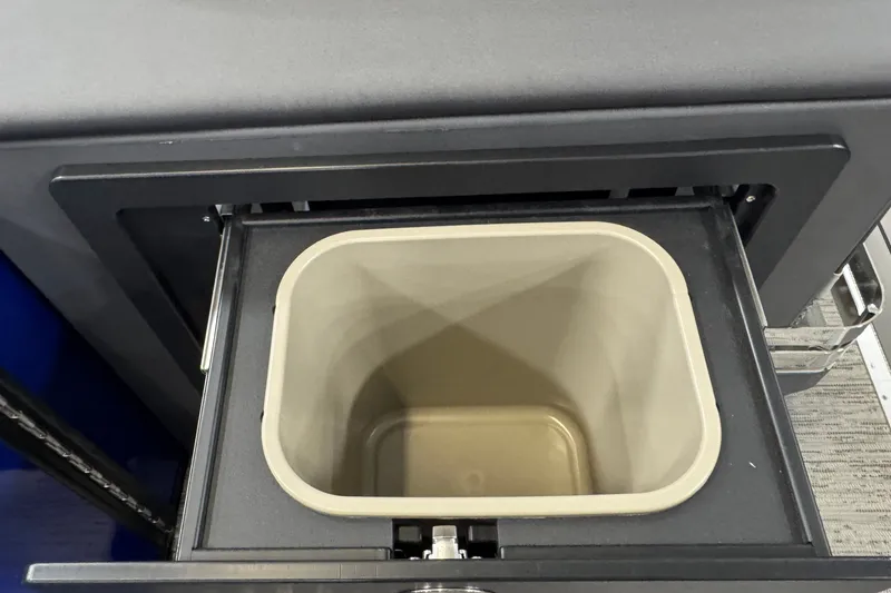 Slide: The Image of Built-in storage compartment on 2026 Bennington 23 M Center Swingback boat. - 16