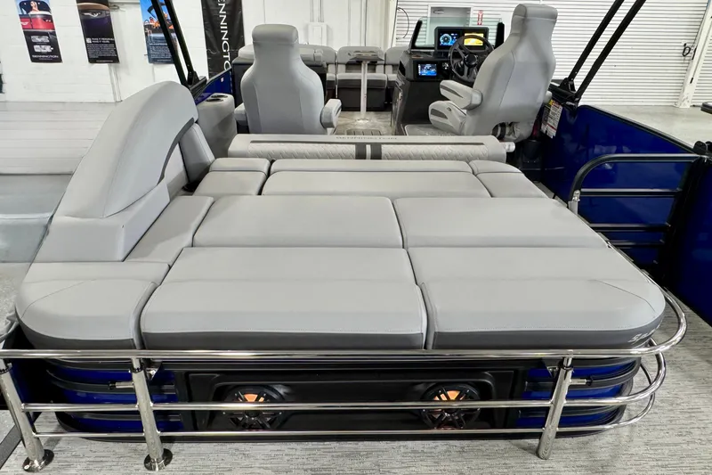 Slide: The Image of 2026 Bennington 23 M Center Swingback with spacious seating and modern interior design. - 18