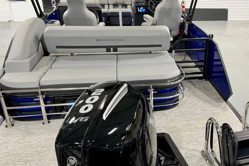 Slide: The Image of 2026 Bennington 23 M Center Swingback boat with Mercury 200 V6 engine, gray seating. - 29