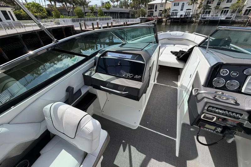 Slide: The Image of 2017 Formula 290 Bowrider interior with sleek seating and modern dashboard controls. - 13