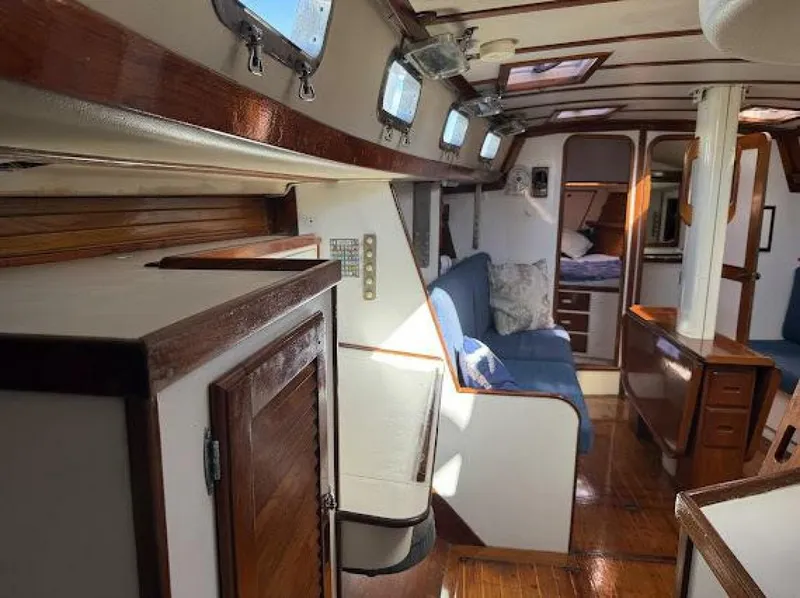 Slide: The Image of Interior of a 1989 Morgan 440 with wood finishes and blue upholstery. - 27