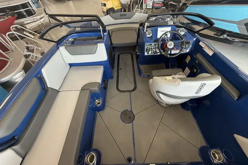 Slide: The Image of Interior of 2026 Heyday WT-2DC boat with modern seating and steering console. - 10