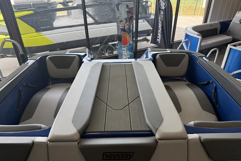 Slide: The Image of 2026 Heyday WT-2DC boat interior with gray seating and sleek design. - 6