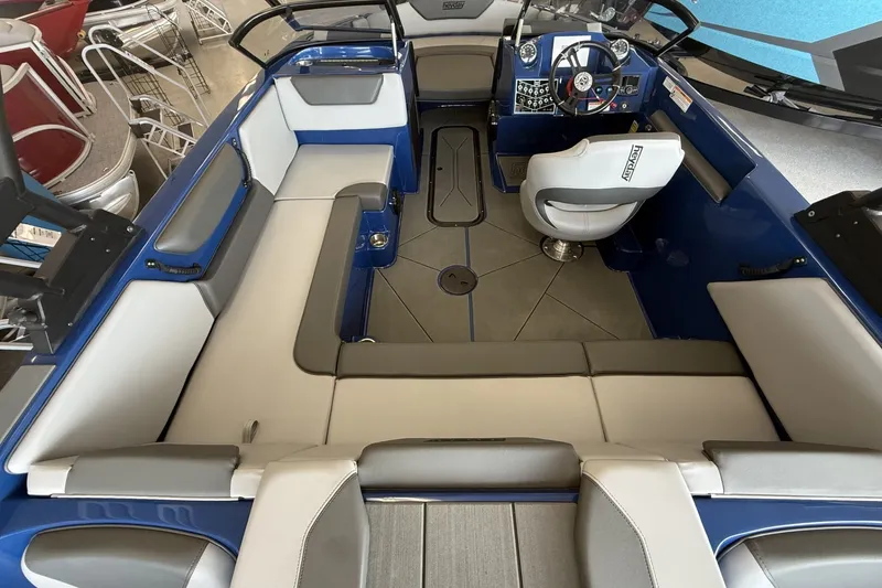 Slide: The Image of 2026 Heyday WT-2DC boat interior with spacious seating and modern helm design. - 9