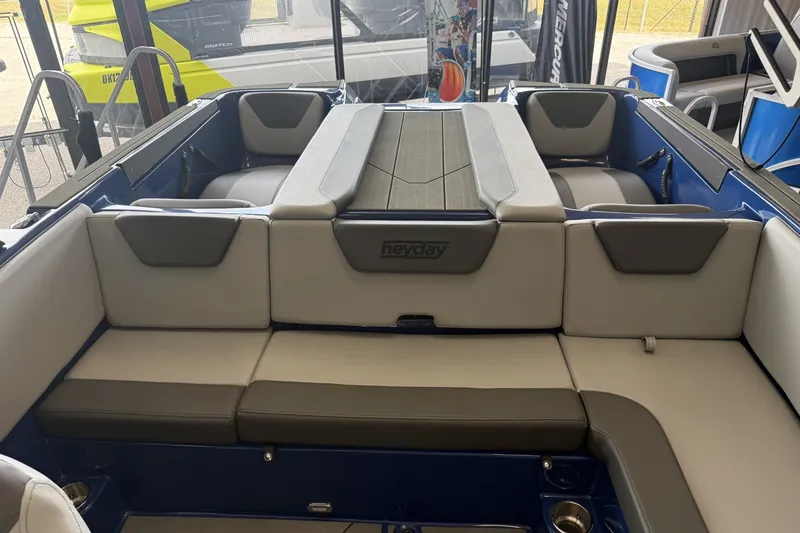 Slide: The Image of 2026 Heyday WT-2DC boat interior with gray seating and modern design. - 7
