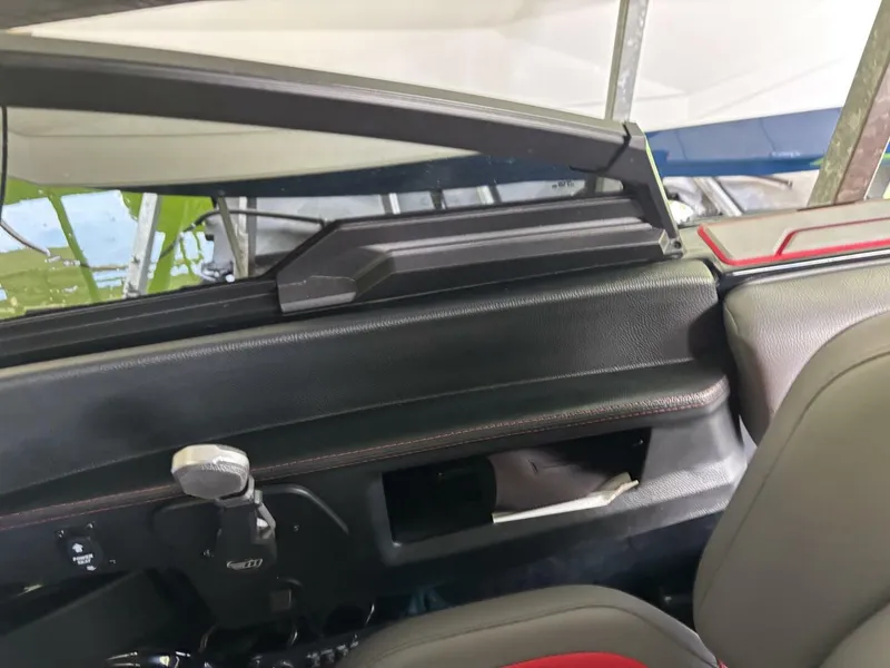 Slide: The Image of Interior view of a 2022 Malibu Wakesetter 23 LSV with modern design and black accents. - 23