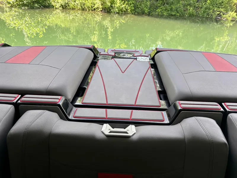 Slide: The Image of The image shows the rear of a 2022 Malibu Wakesetter 23 LSV with stylish upholstery. - 33