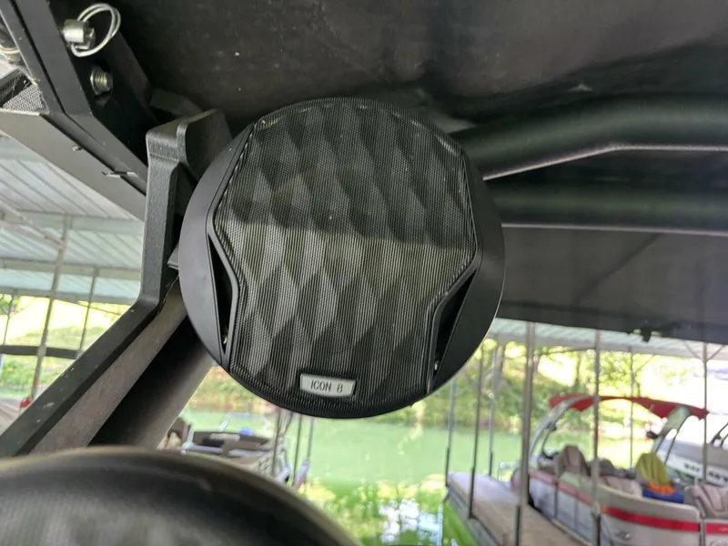 Slide: The Image of Speaker on a Malibu Wakesetter 23 LSV boat, with water in the background. - 47