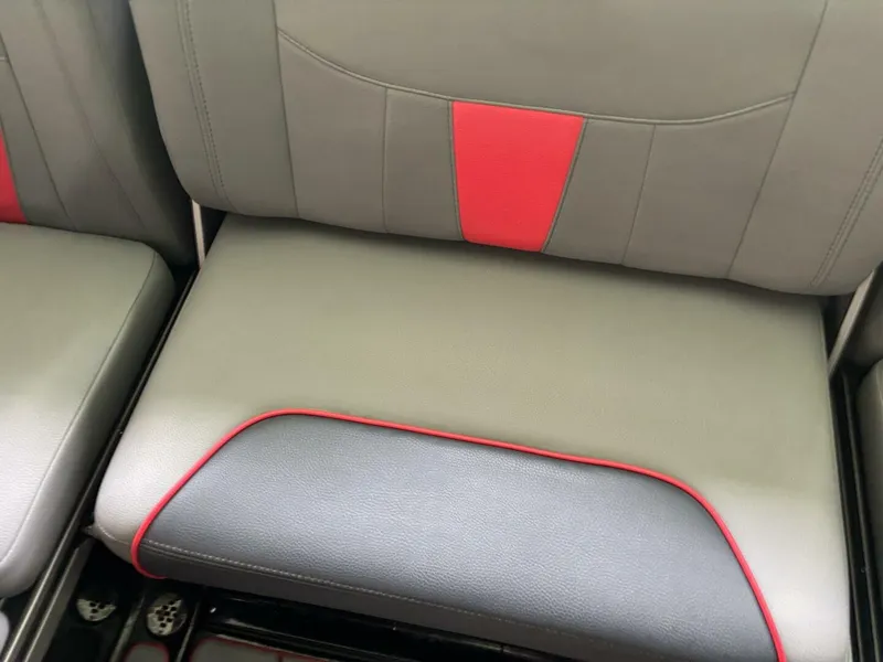 Slide: The Image of Gray and red upholstery on a boat seat, featuring modern stitching and a stylish design. - 21