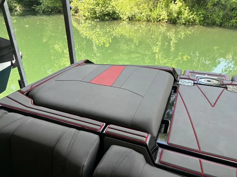 Slide: The Image of The image shows the rear of a 2022 Malibu Wakesetter 23 LSV with cushioned seating. - 30