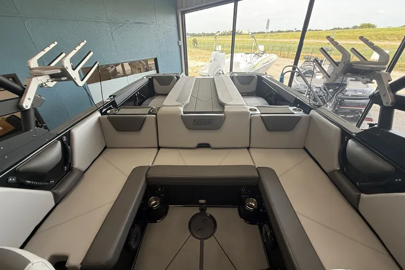 Slide: The Image of 2026 Heyday WTSurf boat interior with spacious seating and modern design. - 7