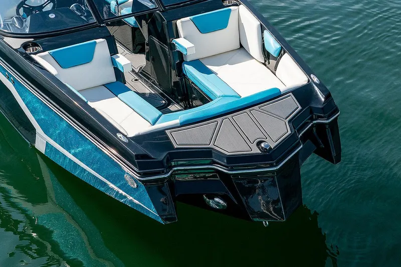 Slide: The Image of Manufacturer Provided Image: 2026 Heyday WTSurf boat with blue and white seats on water. - 18