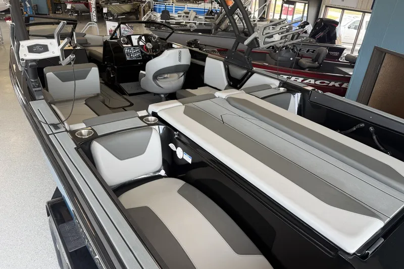 Slide: The Image of 2026 Heyday WTSurf boat interior with modern seating and sleek dashboard design. - 4
