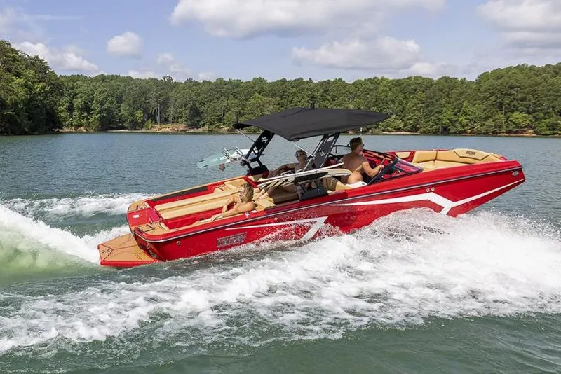 Slide: The Image of Manufacturer Provided Image: Red 2026 Heyday WTSurf boat cruising on a lake. - 14