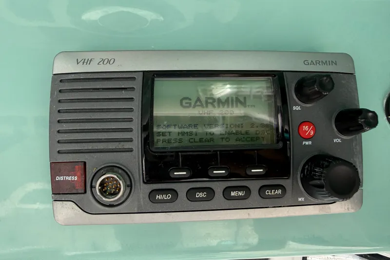 Slide: The Image of Garmin VHF 200 marine radio on 2012 Everglades 325 Center Console boat. - 15