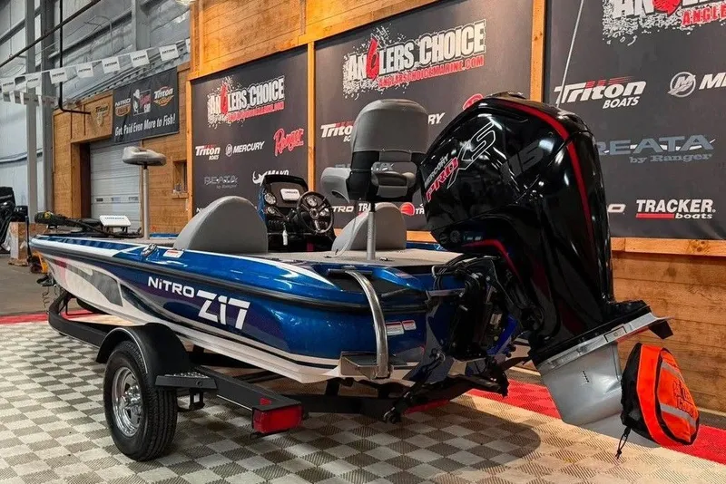 Slide: The Image of 2021 Nitro Z17 boat with powerful outboard motor in showroom display. - 2