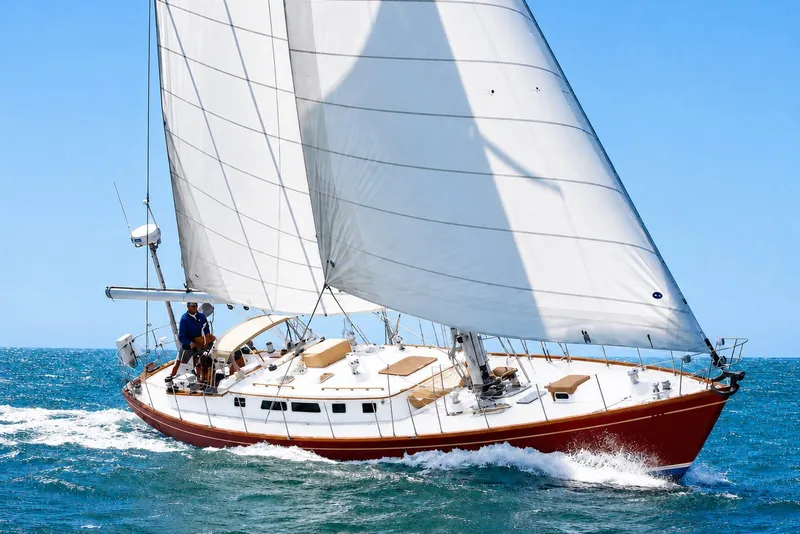 The Image of Sailing yacht Mason 54 from 1989 gliding on blue ocean waters. - 0