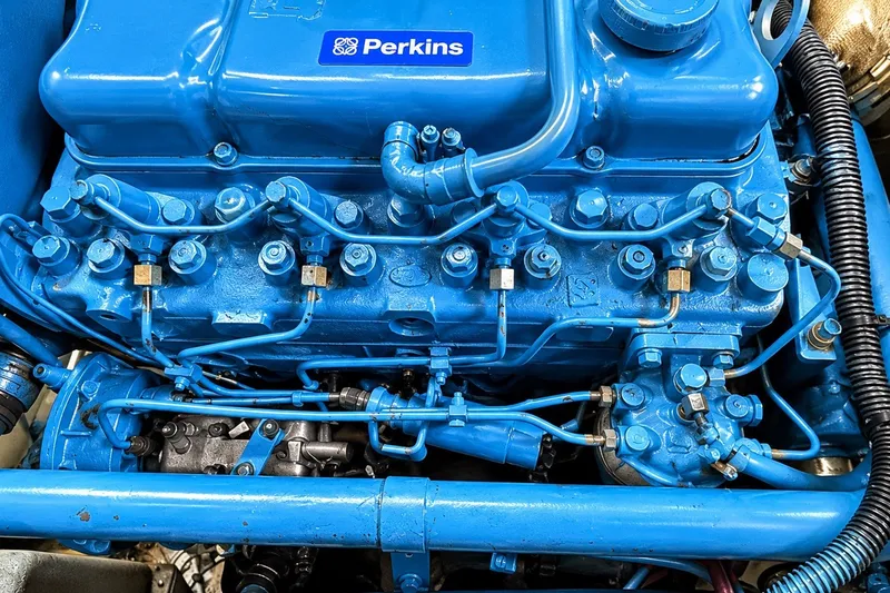 Slide: The Image of Blue Perkins engine in a 1989 Mason 54 boat, detailed view. - 43