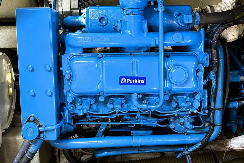 Slide: The Image of Blue Perkins engine in a 1989 Mason 54 model boat. - 42