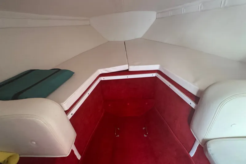 Slide: The Image of Interior cabin of a 2009 Donzi 27 ZR boat with red and white upholstery. - 32