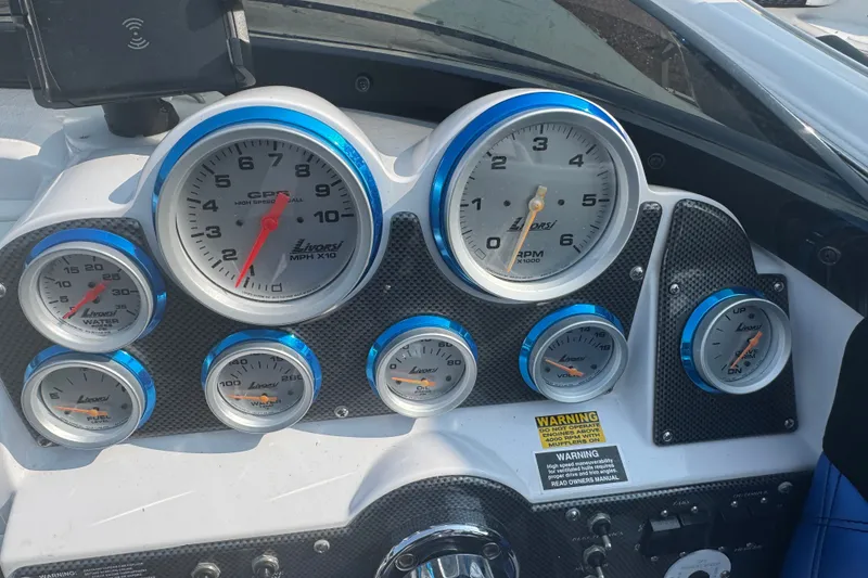 Slide: The Image of Dashboard of a 2009 Donzi 27 ZR boat with Livorsi gauges. - 21