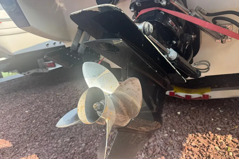 Slide: The Image of Propeller and outdrive of a 2009 Donzi 27 ZR boat on a trailer. - 5