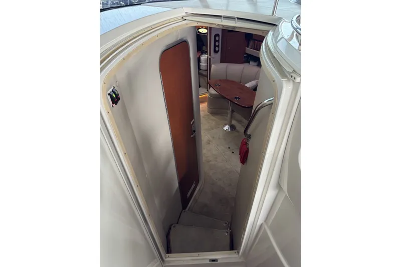 Slide: The Image of Interior view of 2005 Chaparral Signature 350 yacht cabin with seating and table. - 10