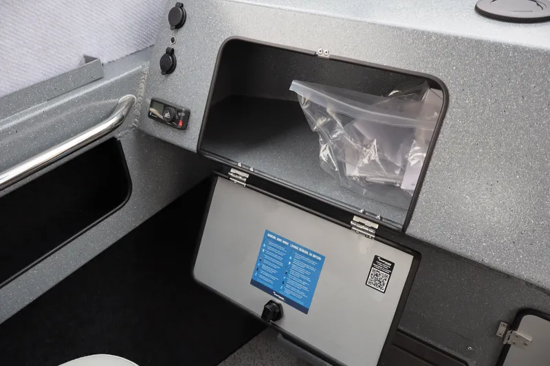 Slide: The Image of Interior storage compartment of 2026 KingFisher 2225 Escape HT boat. - 27
