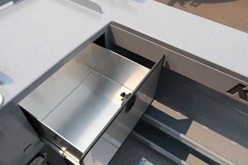 Slide: The Image of Open storage compartment on 2026 KingFisher 2225 Escape HT boat. - 11