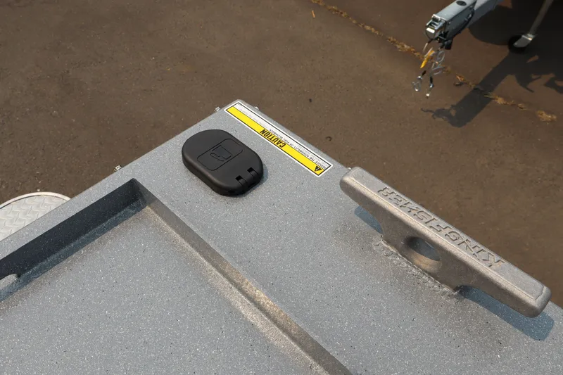 Slide: The Image of 2026 KingFisher 2225 Escape HT boat detail with cleat and caution label. - 8