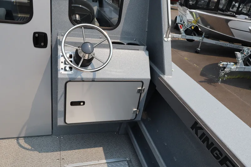 Slide: The Image of Steering wheel and control panel of 2026 KingFisher 2225 Escape HT boat. - 15