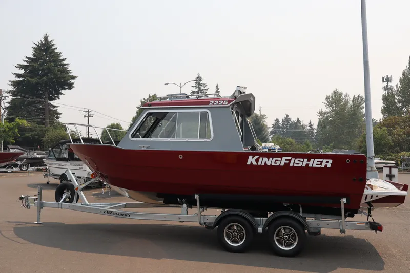 Slide: The Image of 2026 KingFisher 2225 Escape HT boat on trailer in outdoor setting. - 4