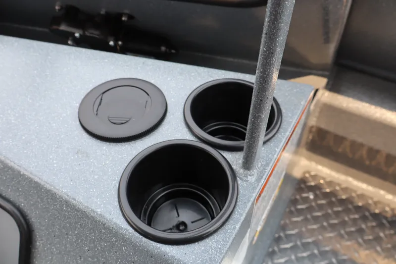 Slide: The Image of Cup holders and storage compartments in a 2026 KingFisher 2225 Escape HT boat interior. - 29
