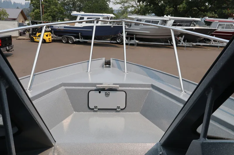 Slide: The Image of 2026 KingFisher 2225 Escape HT boat deck view, showcasing sleek design and sturdy railings. - 30
