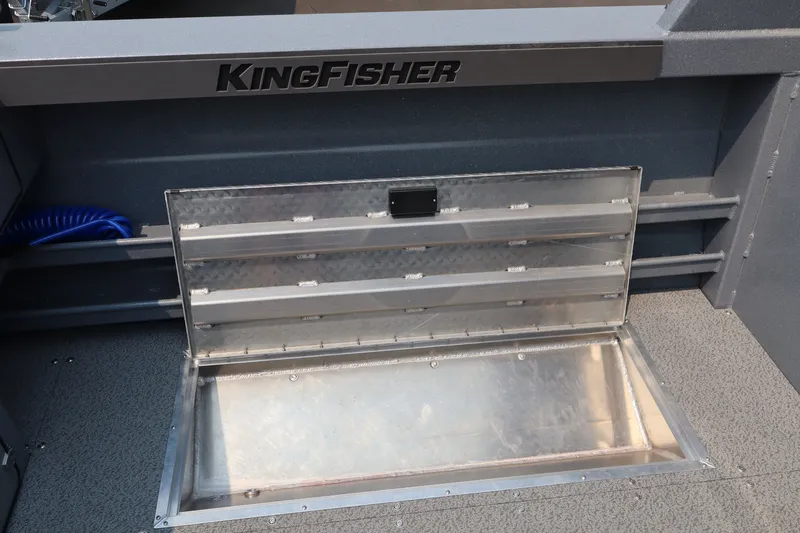 Slide: The Image of Open storage compartment on 2026 KingFisher 2225 Escape HT boat deck. - 16