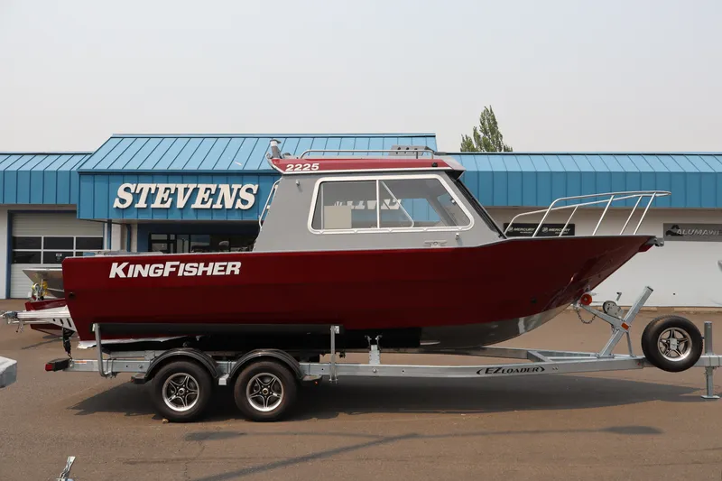Slide: The Image of 2026 KingFisher 2225 Escape HT boat on trailer outside Stevens dealership. - 3