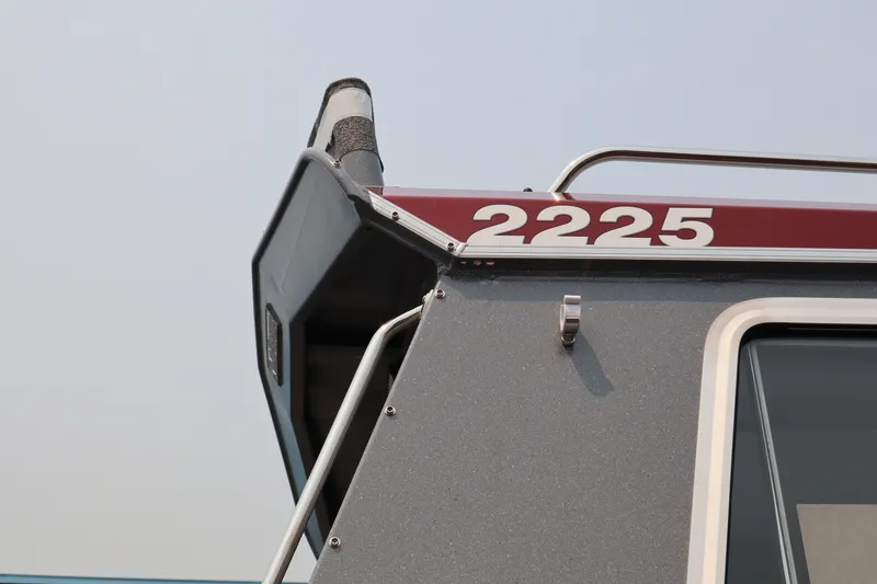 Slide: The Image of KingFisher 2225 Escape HT boat, 2026 model, featuring sleek design and modern detailing. - 5