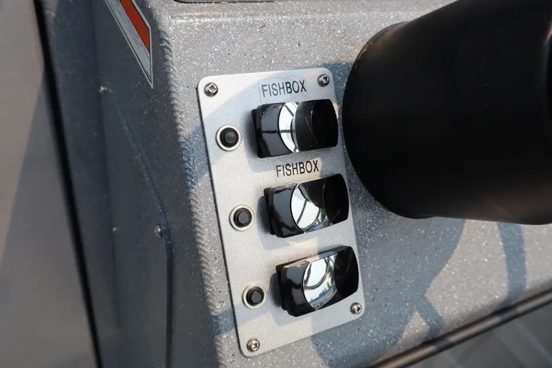 Slide: The Image of Control panel of 2026 KingFisher 2225 Escape HT boat with fishbox switches. - 18