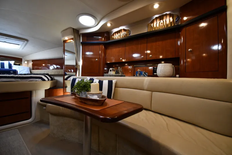 Slide: The Image of Luxurious interior of 2007 Sea Ray 340 Sundancer yacht with elegant wood finishes. - 32