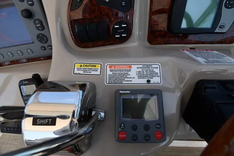 Slide: The Image of Control panel of a 2007 Sea Ray 340 Sundancer boat with navigation equipment. - 13