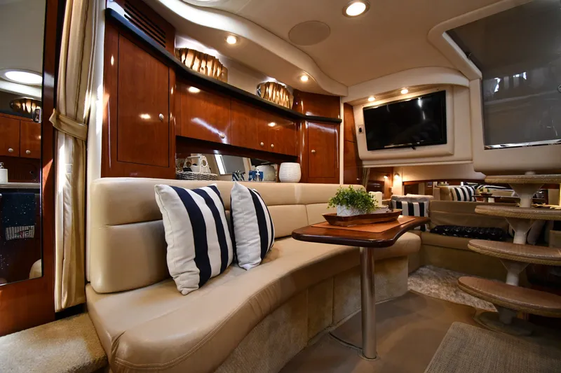 Slide: The Image of Luxurious interior of 2007 Sea Ray 340 Sundancer yacht with plush seating and elegant decor. - 35