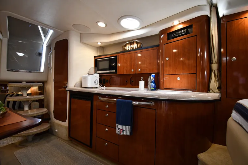 Slide: The Image of Luxurious 2007 Sea Ray 340 Sundancer yacht interior with modern kitchen amenities. - 34