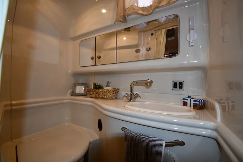 Slide: The Image of Luxurious bathroom interior of 2007 Sea Ray 340 Sundancer yacht with modern fixtures. - 41