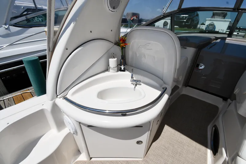 Slide: The Image of 2007 Sea Ray 340 Sundancer boat interior with sleek sink and faucet setup. - 21